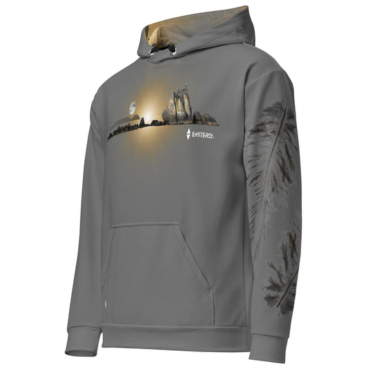 Grey EASTERLY Rise Hoodie with golden Thompson’s Rock sunrise artwork across the chest and tokoeka feather artwork down the left sleeve.