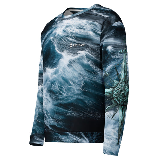 Roaring Forties AOP recycled sweatshirt — front view. Stormy southern ocean waves across the full garment, EASTERLY logo at chest, compass rose detail on right sleeve. EASTERLY NZ.
