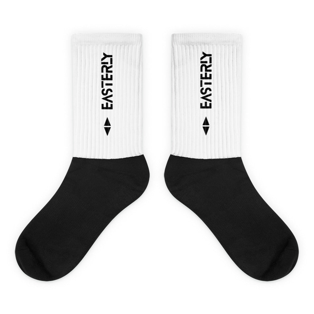 EASTERLY black sublimated socks — flat lay view