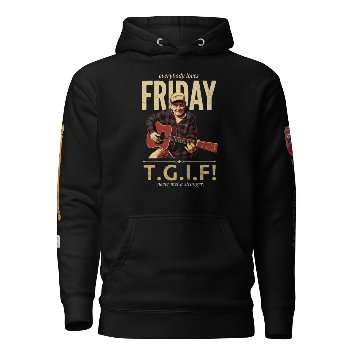 everybody loves FRIDAY — T.G.I.F! hoodie in black, front view. Friday Cavanagh playing guitar, "never met a stranger." Sleeve details visible. EASTERLY.